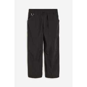 H&M Sport-Joggpants aus wasserabweisendem Nylon Schwarz, Sport – Hosen in Größe XL. Farbe: Black
