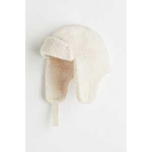H&M Mütze aus Teddyfleece mit Ohrenklappen Naturweiß, Hut in Größe 128/146. Farbe: Natural white